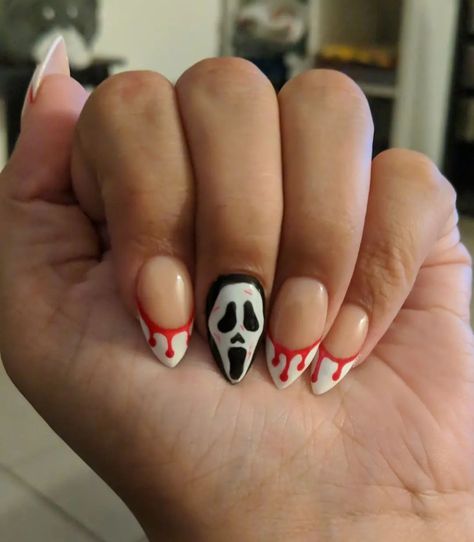 Acrylic nails with Ghostface and blood drip design, stiletto/almond shape Ghost Face Nails Almond, Ghostface Nails Almond, Ghostface Halloween Nails, Short Ghostface Nails, Halloween Nails Ghostface, Nails Ghostface, Stiletto Almond Nails, Blood Drip Nails, Ghost Face Nails