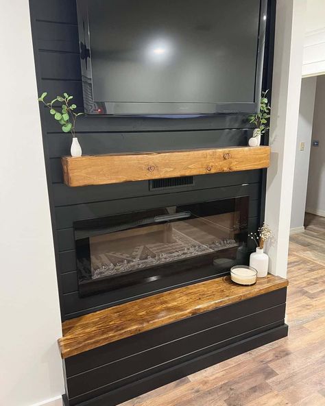 14 Black Shiplap Fireplace To Provide Warmth in Style Black Shiplap Fireplace, Shiplap Bar, Black Shiplap Wall, Black Shiplap, Brown Countertop, Fireplace Accent Walls, Cabin Bar, Wooden Mantel, Wooden Fireplace