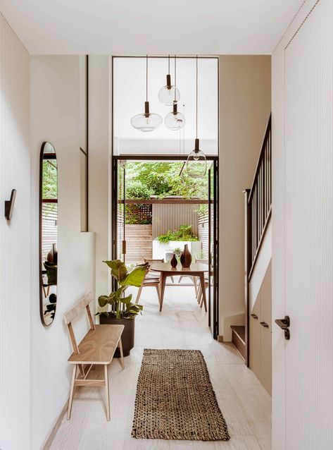 London Mews House, London Minimalist, Minimalist Entrance, Hallway Landing, Staircase Manufacturers, Entrance Hall Decor, Small Space Nursery, Dark Modern, Mews House