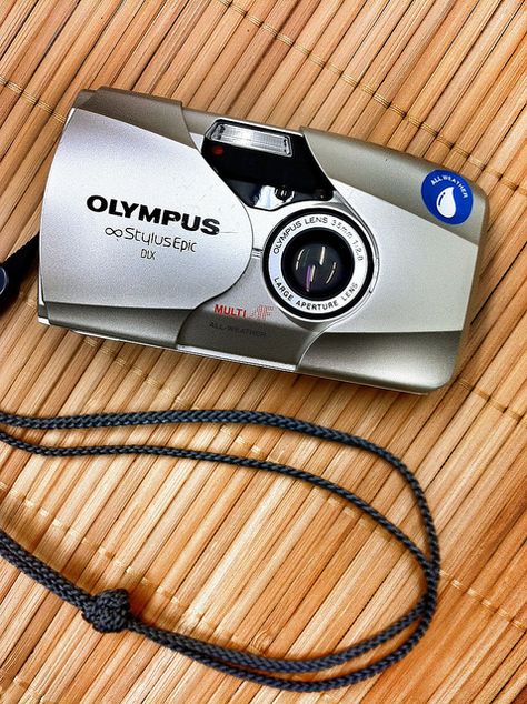 Olympus Stylus Epic Olympus Point And Shoot, Olympus Film Camera Photography, Olympus Film Camera, Pictures Of Cameras, Vlog Camera, Olympus Mju, Olympus Stylus, Spell Cards, Film Camera Photography