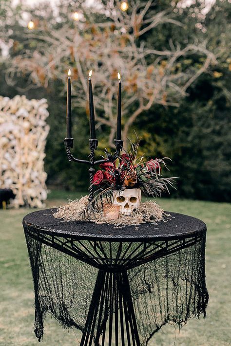 Spooky skeleton themed backyard Halloween party - 100 Layer Cake Halloween Party Skeleton, Subtle Halloween Wedding Decor, 1920 Halloween Party, Black And Gold Halloween Party, Spooky Fairytale Party, Haunted Dinner Party Decor, Haunted Prom Theme, Engagement Halloween Party, Roaring 20s Halloween Party