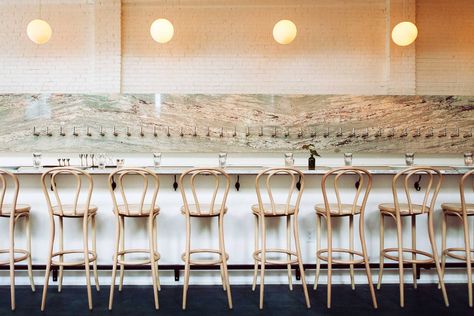 Brewery Bhavana, Bar Lighting Design, White Marble Bar, Blue Shutters, Marble Bar, White Bar, Curved Staircase, Raleigh North Carolina, Bar Interior