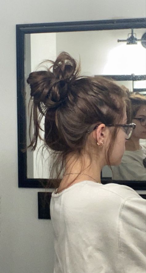 messy bun Messy Bun With Glasses Aesthetic, Brunette With Glasses Aesthetic, Lazy Messy Hairstyles, Messy Bun And Glasses Aesthetic, Loose Buns Messy, Messy Bun Aesthetic Faceless, Messy Cute Hair, Bed Hair Messy, Messi Bun Hairstyles For Wedding