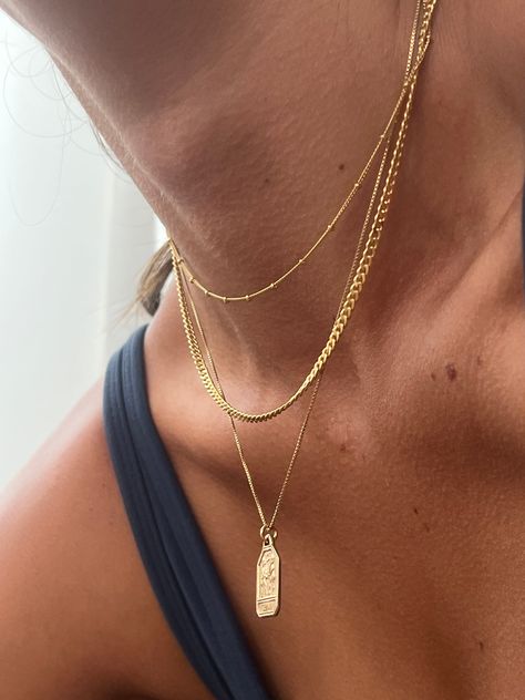 A new chain style in the Olaeda family! The most requested satellite chain is finally here. And, it's available in a choker and necklace length. Cheers to new beginnings. This chain will be a game changer to your layering stack. It's super dainty with an injection of texture and character. - 14k gold filled - Available in 15" & 16" long Gold Layered Chains, Daily Necklace Stack, Gold Stack Necklace, Minimalist Necklace Stack, Gold Necklace Stack Ideas, Dainty Gold Necklace Stack, Gold Chain Layering, Gold Necklace Combo, Gold Chain Stack