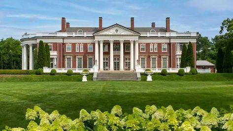 $39.25M Mansion in Lake Geneva Is Wisconsin's Most Expensive Home Boston Architecture, Paneled Library, Lake Geneva Wisconsin, Mansions For Sale, Lakefront Homes, Thatched Roof, Expensive Houses, Lake Geneva, Grand Staircase