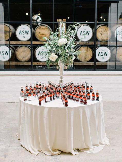 Think outside of the box with your favor display by taking a page out of these couples' books. Favor Table Ideas, Strange Wedding, Favor Display, Favor Table, Wedding Favor Table, Honey Wedding Favors, Creative Wedding Favors, Inexpensive Wedding Favors, Winter Wedding Favors