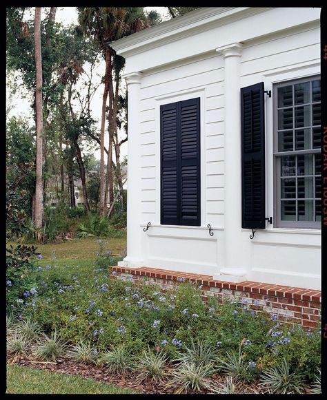 Just Fake It River House Exterior, Colorful Shutters, Bermuda Shutters, Shutter Dogs, Shutter Ideas, Beach Houses Architecture, White Exterior Houses, Louvered Shutters, Fake Window