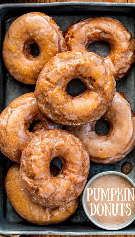 Overhead of a Pan of Glazed Pumpkin Donuts. Fall Donut Recipes, Pumpkin Doughnut Recipe, Pumpkin Donuts Baked, Donut Recipe Fried, Micro Bakery, Pumpkin Spice Doughnuts, Pumpkin Donuts Recipe, Pumpkin Fritters, Donut Calories