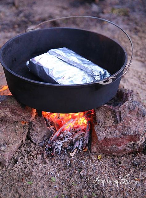 The best ham and cheese sliders- camping style! Cook these delicious little sandwiches on the camp fire or in the oven. Perfect for a crowd and can be made ahead #recipe #camping  skiptomylou.org Dutch Oven Camping Recipes, Dutch Oven Camping, Cheese Sliders, Dutch Oven Cooking, Dutch Oven Recipes, Camping Style, Campfire Food, Cast Iron Dutch Oven, Campfire Cooking