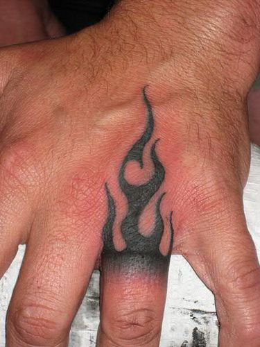 Tribal Flame hand tattoo by Jon Poulson | Flickr - Photo Sharing! Men Finger Tattoos, Wedding Ring Finger Tattoos, Tattoos Infinity, Wedding Ring Tattoo, Finger Tattoo For Women, Finger Tats, Tattoo Wedding Rings, Ring Finger Tattoos, Finger Tattoo Designs