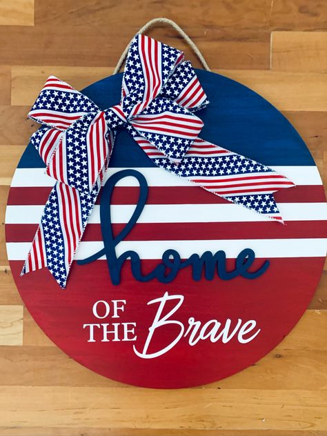 This beautiful red, white and blue front door sign is made on an 18" round wood board painted in acrylics and covered in a clear coat for protection. Blue Front Door, Front Door Hanger, Front Door Sign, Front Door Signs, Painted Boards, Door Sign, Wood Board, Clear Coat, Door Signs