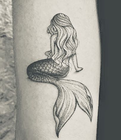 Twin Mermaid Tattoo, Mermaid Sitting Tattoo, Tarzan Tattoo Ideas My Heart, Back Of Mermaid Tattoo, Mermaid On The Moon Tattoo, Mermaid Tattoo Black And White, Feminine Mermaid Tattoo, Mermaid Wave Tattoo, Mermaid Ankle Tattoo