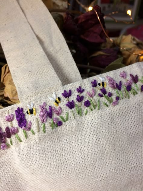 Cloth Bag Embroidery, Embroidery Aesthetic Clothes, Flower And Bee Embroidery, Embroidery Flowers Lavender, Lavender And Bee Embroidery, Simple Flower Stitch Embroidery, Embroidered Bee Simple, Simple Bee Embroidery Tutorial, Simple Clothes Embroidery