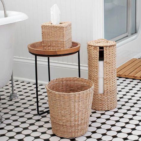 "Find the Household Essentials Wicker Bathroom Accessories Set at Michaels. com. Give your bathroom a rejuvenated look that is both fresh and classic with this collection of wicker bathroom accessories. Give your bathroom a rejuvenated look that is both fresh and classic with this collection of wicker bathroom accessories. This 3-piece set includes a standing toilet paper holder, a tissue box cover, and a wastebasket all made from matching, natural cattail and paper wicker with cream-colored acc Top Of Toilet Wicker Basket, Bathroom Period Basket, Airbnb Toiletry Basket, Classic Bathroom Decor, Wicker Bathroom, Paper Wicker, Standing Toilet Paper Holder, 3 Piece Bathroom, Boho Bathroom Decor