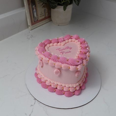 Pink heart cake with a touch of gold 🩷👑 - Cake Details - Size: Mini 6” (2 layers) Add-ons: Pearls (edible) + glitter dust (edible) #emmacakes #emmacakesseattle #customcakesseattle #heartcakesseattle #heartcake #vintagecake #seattlecakes #seattlebakery Layer Cake Rose, Mini Heart Cake, Pink Heart Cake, Heart Shape Cake, Barbie Bday, Edible Glitter Dust, 19th Bday, Cake Rose, Shaped Cakes