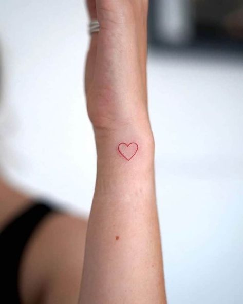 23. A red ink small heart hand tattoo Small Heart Outline Tattoo, Kissing Hand Tattoo, Hand Drawn Heart Tattoo, Heart Hands Tattoo, Small Red Ink Tattoo, Heart On Finger, Small Heart Wrist Tattoo, Heart Hand Tattoo, Finger Heart Tattoo