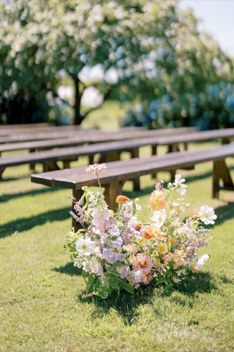 Larkspur, zinnias, sweet peas, dahlias, pansies, cosmos, phlox, flowering oregano, nicotiana artfully deisgned into a stunning summer growing arrangement for the wedding aisle. Summer Wedding Flower Arrangements, Vibrant Summer Wedding, Whimsical Wedding Flowers, Dahlias Wedding, Neutral Wedding Flowers, Colorful Wedding Flowers, Skagit Valley, Aisle Flowers, Wedding Flowers Summer