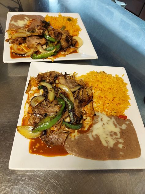 Stop by today and enjoy our special: Enchiladas Rancheras!  Three cheese enchiladas topped with Carnitas (slow cooked pork), grilled peppers and onions.  Served with Spanish rice and refried beans. Enchiladas Rancheras, Rice And Refried Beans, Grilled Peppers And Onions, Grilled Peppers, Slow Cooked Pork, Cheese Enchiladas, Spanish Rice, Three Cheese, Peppers And Onions