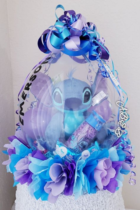 Stitch gift stuffed balloon with matching decorations. 
Highlights: Handmade 
#stitchstuffedballoon Stitch Birthday Gift Ideas, Stuffed Balloon Ideas Gifts Diy, Lilo And Stitch Balloons, Stitch Gift Basket, Stuffed Balloon Ideas Gifts, Balloon Gift Ideas, Stitch Bouquet, Valentines Balloons Bouquet, Lilo And Stitch Toys