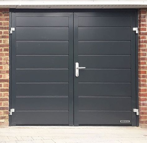 Hormann Horizontal M Ribbed Side Hinged Garage Door Finished In Anthracite Grey & Installed By Our New Malden Branch.  If you’re looking to replace your garage door, we supply & fit all types including both side hinged & sectional garage doors. Call 0800 716 569 to speak with one of our experts or alternatively, visit www.accessgaragedoors.com to book your free survey. #sidehingedgaragedoor #Hormann #Upminister Horizontal Garage Door, Side Hinged Garage Doors Uk, Hormann Garage Door, Garage Door With Pedestrian Door, Garage Doors Uk, Hinged Garage Doors, Side Hinged Garage Doors, Metal Garage Doors, Single Garage Door