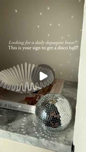 Britt Bengoechea on Instagram: "What an absolute dopamine boost this little disco ball gives me in the morning! ✨🪩 if you don’t have one…this is your sign to get one! The sheer joy it brings watching the light play🥹

Comment ‘DISCO’ if you want the link to this exact one💃🏼🕺🏻

#cottagecore #homesweethome #modernhome #interiorinspiration #europeaninteriors #diyprojects #homesohard #trendingnow #stylingmyhome #inspiringhomesquares #interiordesign #trendingreels #inspiremeneutral #trending #mynaturalabode #homesohard #vintagestyle #aesthetic #cozyhome #diy #dopaminedecor #discoball #discoballdecor 

Moody, earthy, classic, timeless, paint, cozy cottage home, cozy room, paint colours, organic modern style, disco ball decor, dopamine decor" Disco Ball Styling, Dopamine Boost, Cozy Cottage Home, Disco Ball Decor, Me In The Morning, Organic Modern Style, Dopamine Decor, Home Cozy, Paint Colours