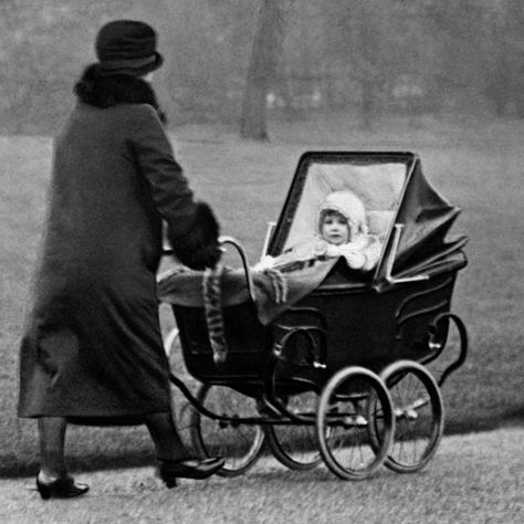 In pictures: Queen Elizabeth II at 90 in 90 images - BBC News Walking Baby, Young Queen Elizabeth, Vintage Pram, Wallis Simpson, Rainha Elizabeth Ii, Reine Elizabeth Ii, Dog Stroller, Reine Elizabeth, British Royal Families