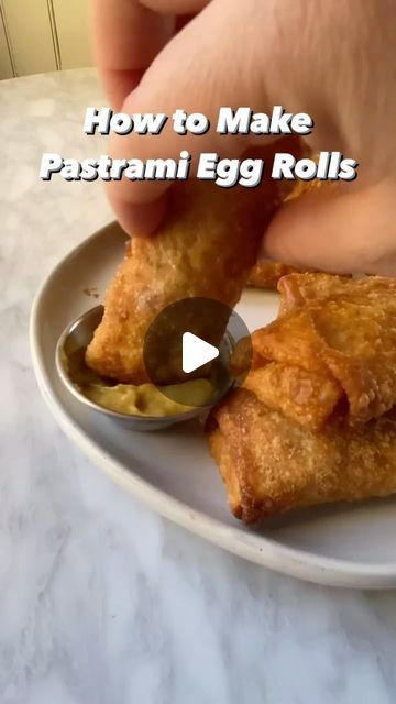 The Nosher on Instagram: "Every Jewish Christmas needs this easy pastrami egg roll recipe from @shasarna 🍾 Full instructions below: 

- store-bought egg rolls wrappers (you can find in the produce section of many major supermarkets)
- 1 lb sliced pastrami, chopped
- prepared sauerkraut (approximately 1 1/2 cups)
- water for sealing
- vegetable oil for frying
For the dipping sauce (optional):
- 1 cup prepared duck sauce mixed
- 1/4 cup brown mustard for dipping
Directions
1. Heat vegetable oil in a large pot over medium-high heat.
2. Add around 2-3 Tbsp chopped pastrami on top of each egg roll wrapper.
3. Add 1 Tbsp sauerkraut on top of pastrami.
4. Fold sides of wrapper in (with points facing inwards). Pull large flap over the top and begin to roll tightly. (Watch video above for how to r Egg Rolls Wrappers, Pastrami Egg Rolls Recipe, How To Make Pastrami Homemade, Pastrami Brine Recipe, Home Made Pastrami, Katz Deli Pastrami Recipe, Pull Large, Egg Roll Wrapper, Jewish Christmas