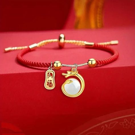 Embrace the dragon energy with these stunning charm bracelets featuring a pearl-like gem 🐉#jewelry #jewellery #jewelryshop #jewelrystore #etsy #etsyjewelry #bracelet #bracelets #yearofthedragon #dragon #dragons #luck #goodluck #chinesenewyear #chinese #dragoncharm #charmbracelet #pearl #gold #goldjewelry #zodiac #chinesezodiac #necklace #necklaces #necklaceshop #dragonbracelet #dragonjewelry #zodiacjewelry #chinesejewelry #womensjewelry #HandmadeJewelry Happy New Year Gift, Dragon Year, Bracelets With Meaning, Dragon Bracelet, Rope Jewelry, New Dragon, Red Rope, Dragon Jewelry, Dragon Pendant