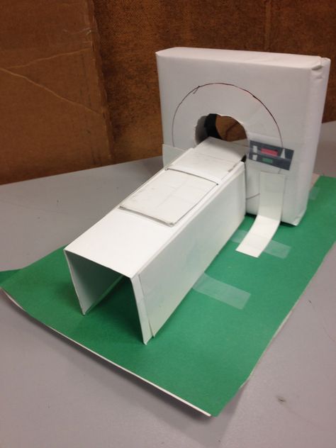 Medical Play/Prep- CT/MRI machine using cardboard, tape & marker. #ChildLife #LooseParts Cardboard Hospital, Medical Play, Child Life Specialist, Life Tools, Imaginary Play, Street Kids, Helping Children, Child Life, Dramatic Play