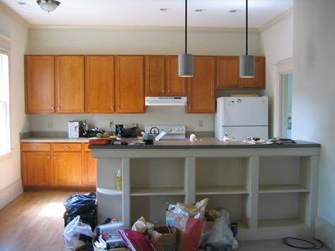 Plans are already being drawn up to put these shelves in under the bar! :-) Under Counter Shelves, Shelves Interior Design, Kitchen Shelf Unit, Under Counter Storage, Kitchen Design Modern Contemporary, Counter Shelves, Kitchen Bar Ideas, Kitchen Bookshelf, Stool Storage