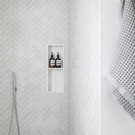 30 Amazing Herringbone Tile Bathroom Ideas To Sprinkle Personality Herringbone Tile Floor Small Bathroom, Bathroom White Herringbone Tile, White Subway Herringbone Bathroom, Large Subway Tile Shower White Herringbone, Bathroom Herringbone Tile Floor Master Bath, Herringbone Tile Wall Bathroom, Shower With Herringbone Tile, Bathroom Remodel Herringbone Tile, Herringbone Bathroom Ideas