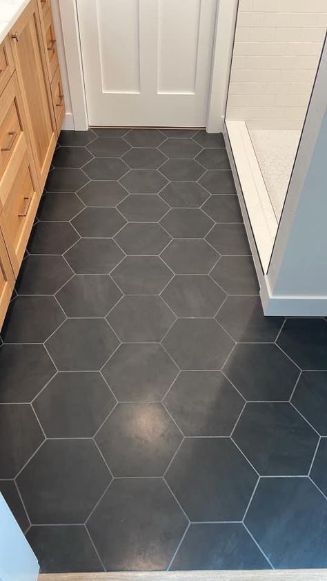 Hex Tile Entryway, Dark Gray Hexagon Tile Bathroom Floor, Carerra Tile Bathroom Floor, Charcoal Hexagon Tile Bathroom, Black Hexagon Tile Laundry Room, Dark Grey Tile Floor Bathroom, Black Octagon Tile Bathroom, Foyer Tile Ideas Entryway, Large Hexagon Tile Floor