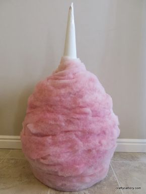 Cotton candy decoration. I used fake spider webs from the dollar store instead of the material used in the insides of a quilt. Cotton Candy Decorations, Candy Props, Vanellope Y Ralph, Candy Decorations Diy, Giant Lollipops, Willy Wonka Party, Diy Christmas Candy, Candy Themed Party, Fake Spider