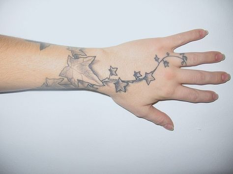 Wrist Tattoos by BlaqqCat Tattoos, via Flickr English Ivy Tattoo, Believe Wrist Tattoo, Braclet Tattoo, Love Wrist Tattoo, Wrist Tattoos Words, Wrap Around Wrist Tattoos, Ivy Tattoo, Meaningful Wrist Tattoos, Cool Wrist Tattoos