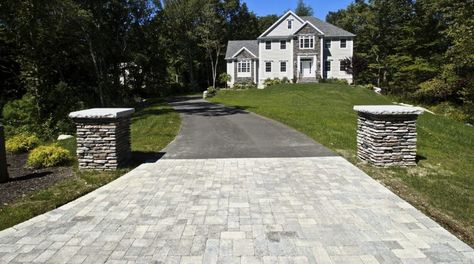 9 Driveway Pillars to Make Your Home Stand Out Driveway Pillars Entrance, Driveway Entrance Columns, Driveway Entrance Pillars, Brick Pillars Driveway Entrance, Driveway Pillars With Lights, Driveway Entrance Ideas, Driveway Columns, Driveway Pillars, Landscaping Entrance