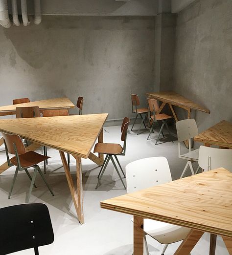 UENOA installs transformable triangular table system in tokyo dining space Triangular Table, Wooden Sconces, Creative Office Space, Japanese Architecture, Colorful Chairs, The Basement, Construction Company, Office Interior Design, Architecture Firm