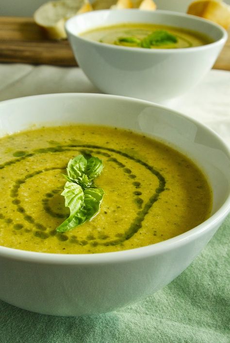 Zucchini and sweet potato soup, with a hint of fresh basil. #soup Soup Potato, Zucchini Soup Recipes, Zucchini Soup, Vegan Soups, Sweet Potato Soup, Vegan Soup, Homemade Soup, Zucchini Recipes, Potato Soup