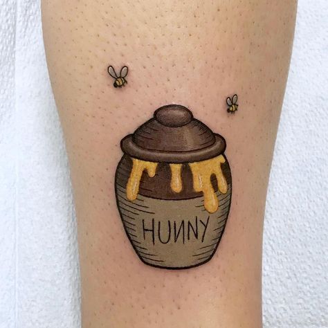 Ever wonder what sort of tattoos literary characters might get? We've come up with a few ideas. Honey Pot Tattoo Ideas, Honey Bun Tattoo, Hunny Pot Tattoo, Winnie The Pooh Honey Pot Tattoo, Honeypot Tattoo, Honey Pot Tattoo, Pot Tattoo, Pooh Tattoo, Pooh Honey Pot