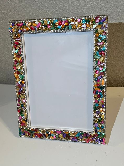 Have you ever seen anything more beautiful 😍 than this frame It's completely front covered in crystal gems with rhinestones trim, and then covered with diamond rhinestones all around the edges!!  ALL FRAMES ARE GLASS, HIGH QUALITY , and have both easel  or can be mounted!  this Frame size pictured is 5x7 and can be hung or placed on table top! I also have an 8x10 shown In the last two pics as well as a 6x6 please keep in mind this is not a uniform frame so diamond and stone placement will vary Cadre Photo Diy, Jeweled Picture Frame, Jeweled Picture, Painted Picture Frames, Picture Frame Crafts, Mirror Frame Diy, Picture Frame Decor, Bead Frame, Diy Picture Frames