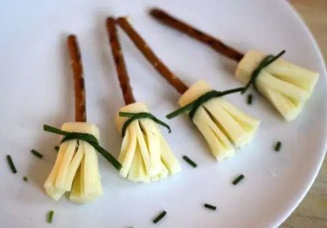 TODAY’S HEALTHY HALLOWEEN FOOD POST WAS MADE POSSIBLE BY PINTEREST. You’ve seen them, haven’t you? These adorable witches’ brooms made from string cheese, pretzels and chives? On this particular day, with the pressure of supplying the preschool snack falling squarely on my shoulders, I bravely tried to recreate one of the zillion wow-I-can’t-believe-other-moms-are-doing-this ideas from... Read More » Halloween Cooking, Healthy Halloween Food, Fall Eats, Halloween Snacks For Kids, Postres Halloween, Healthy Halloween Treats, Witches Broom, Healthy Halloween Snacks, Halloween Party Snacks