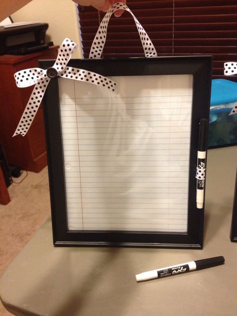 Took the picture frame dry erase board idea seen on Pinterest and added a holder on the frame for the dry erase marker. I also attached a ribbon to the back so that it can be hung on a wall! Now for some personalization with names at the bottom of the frame (finished product coming soon)! Picture Frame Whiteboard Diy, Picture Frame Dry Erase Board Diy, Erase Board Ideas, Dry Erase Board Ideas, Diy Dry Erase Board, Cubicle Decor, Towel Crafts, Command Center, Craft Room Organization