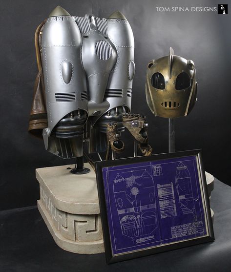 Our client had a set of Rocketeer movie props including a screen used jetpack with gauntlets, helmet and Hughes blueprints for the pack as well. Rocketeer Movie, Billy Campbell, Armadura Ninja, Rocket Pack, Movie Replica, Spy Gear, Sci Fi Tv Shows, Film Props, Prop Making