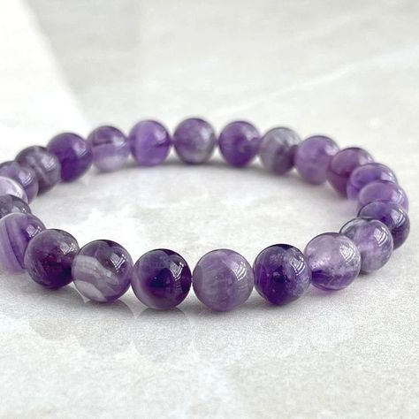 Amethyst Bracelet Available at Mirani Agate Contact on +918200039627 or Click here :- https://wa.me/918200039627 #amethyst #amethystjewelry #amethystcrystal #amethyststone #amethystgemstone #amethystbracelet #amethystbeads #bracelet #braceletstacks #braceletlover #braceletsoftheday #explorepage #trending #explore Amethyst Accessories, Amethyst Beaded Bracelet, Shambala Bracelet, Amethyst Bracelet Beads, Purple Wedding Cakes, Stretchy Beaded Bracelet, Rakhi Design, Slide Bracelet, Xmas Wishlist