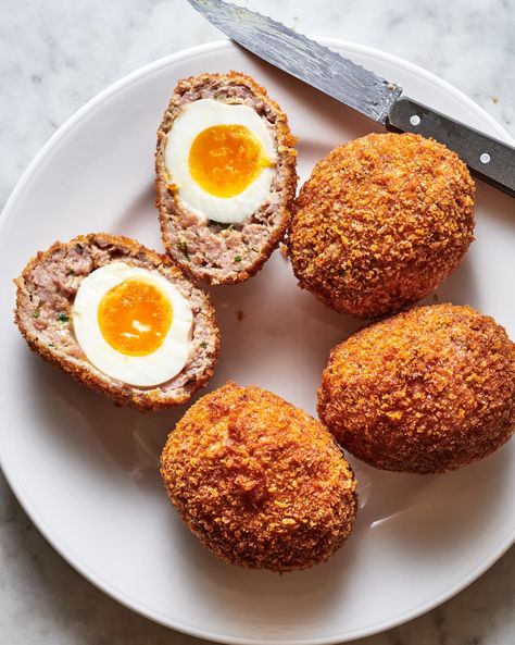 Scotch Eggs Recipe (the Best, Easiest Guide) | Kitchn British Snacks, Scotch Eggs Recipe, Scotch Egg, Scotch Eggs, Seasoned Bread Crumbs, Eggs Recipe, British Food, Savory Breakfast, Sausage Breakfast