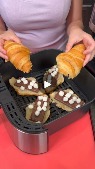 How did I not know this s'mores trick! 😍 (Easy Dessert) | How did I not know this s'mores trick! (Easy Dessert) 
I make s'mores sandwhiches using croissants

This original video was produced by Network Media and... | By My Life | Marshmallows on top of your
chocolate. Just do just a couple. You don't need that
much. You place the top of your croissants right on top just
like that Right and it's ready to go inside your air fryer.
I'm going to air fry this for five minutes at 350. Super
quick and easy dessert in the air fryer. So you only actually
need to leave your s'mores in there for a couple minutes.
Maybe about 2 minutes. It's perfect enough for a tropic to
get melted. And look at that. Your croissants are nice and
toasty. Ah. Who needs a cracker when you have a croissant
s'more sandwi Smores Croissant, Dessert Ideas Easy, Hersheys Chocolate, Back To School Recipes, Mini Croissants, Cooking Desserts, School Recipes, It's Too Hot, Chocolate Marshmallows