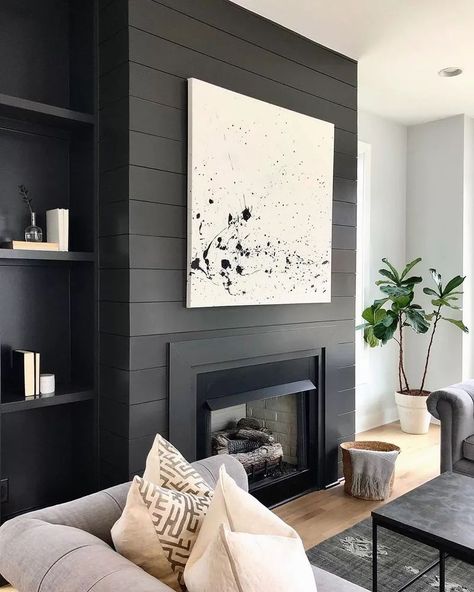 Black fireplace #interiordesign #interiorstyling #interiordecorating #homedecor #decor #interiors #stylishinteriors Moody Paint, Black Fireplace, Shiplap Fireplace, Fireplace Remodel, Home Fireplace, Modern Fireplace, Fireplace Wall, Living Room Storage, Fireplace Design