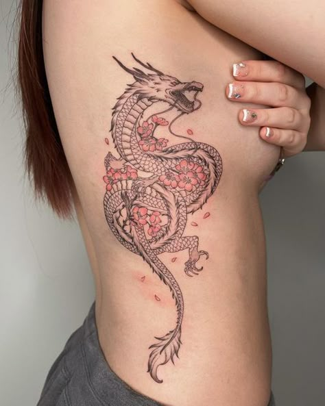 Dragon Back Tattoo Women Cherry Blossoms, Asian Dragon Tattoo For Women Back, Japanese Tattoos Dragon Cherry Blossoms, Cherry Blossom Dragon Tattoo Men, Cherry Blossom Tattoo With Dragon, Japanese Dragon Cherry Blossom Tattoo, Dragon And Cherry Blossom Tattoo Designs, Chinese Dragon With Flowers Tattoo, Chinese New Year Dragon Tattoo