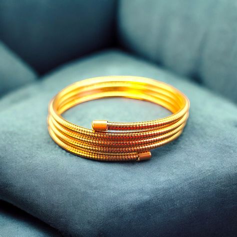 Exclusive deal alert! Stylish Gold-Plated Coil Bangle Bracelet Set – Perfect for Any Occasion, available for a limited time at the incredible price of ₹1000.00 Bangle Bracelet Set, Bangle Bracelet, Bracelet Set, Limited Time, Bangle Bracelets, Bangles, Plating, The Incredibles, Bracelet