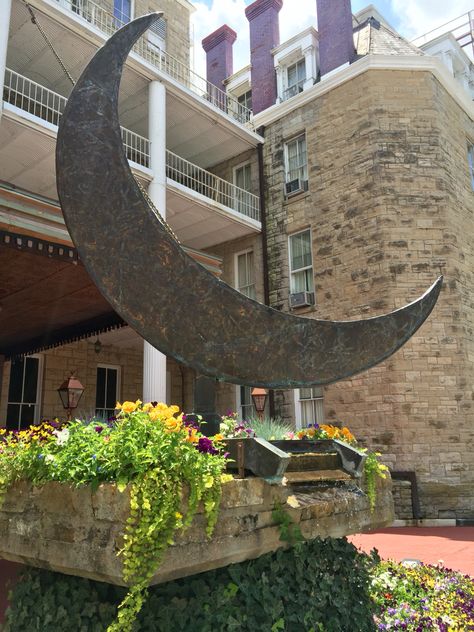 The Crescent Hotel and the magnificent crescent moon statue in the front. #eurekasprings #crescenthotel Crescent Hotel Eureka Springs, Crescent Hotel, Better Cr Dr, Eureka Springs, Haunted Places, Crescent Moon, Crescent, Homecoming, Springs