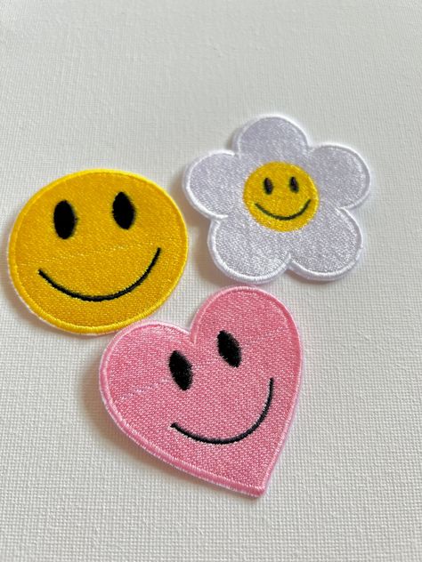 Flower heart smiley face embroidered patches, iron / sew on patches, cute patches, patches, embroidered patch, flower patches, cool patches, by shopchinguembroidery on Etsy Heart Smiley Face, Kaws Painting, Heart Smiley, Embroidery Frame, Cute Patches, Cool Patches, Flower Patch, Sewing Needle, Straight Stitch